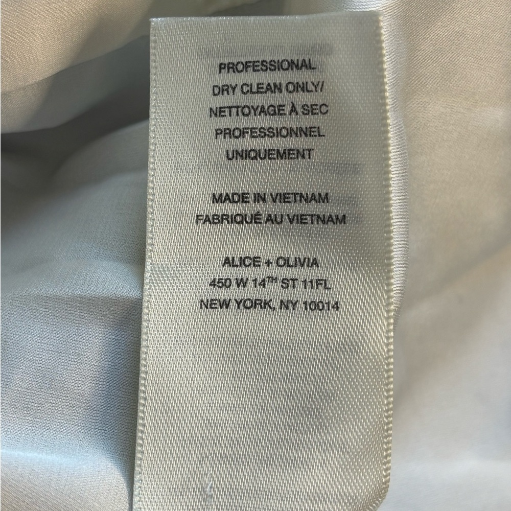 Alice + Olivia Bouclé Colorblock Jacket
Cream, Black Medium Wool + Alpaca Blend - Picture 7 of 8
